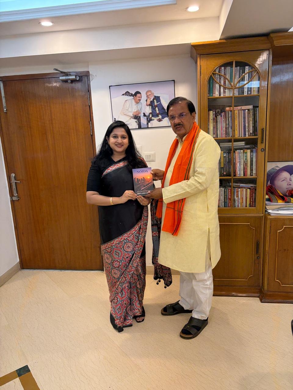 Book 'Noida' — Presented to Noida MP Dr. Mahesh Sharma